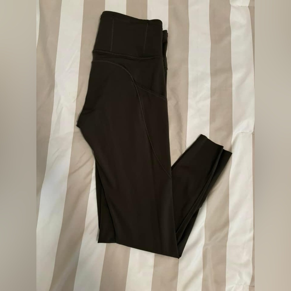 Lululemon Fast and Free 25”. Size 6. Dark/Olive Green color.